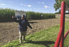 Chris Pertschy from Timac Agro Canada explains the company’s trial plots using a range of biostimulants, enhanced fertilizers and other crop health products at the Discovery Farm Woodstock.