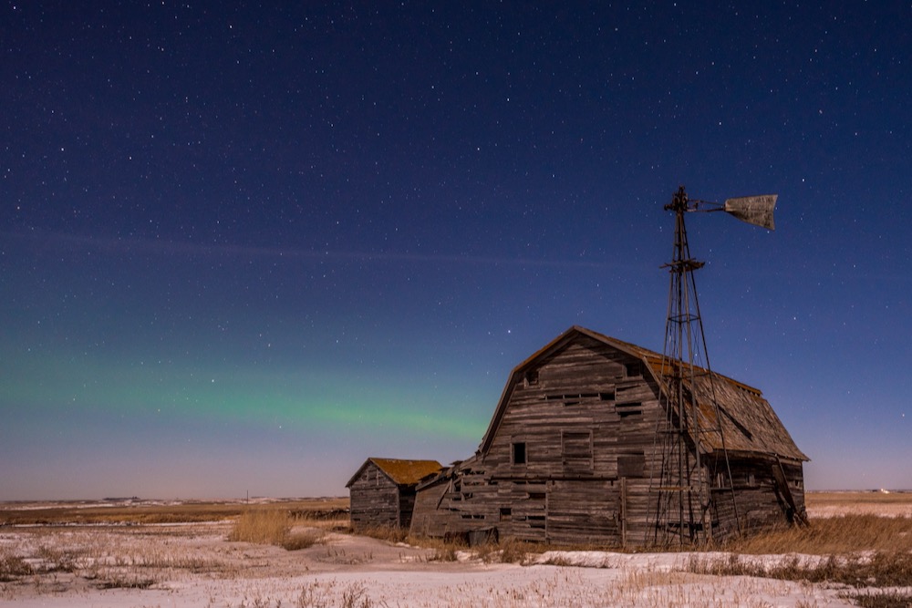 File photo of the northern lights over snow and stubble on a Saskatchewan field. (Nancy Anderson/iStock/Getty Images)
