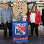 (LtoR) Stephanie Ashton-Smith, Feed Ontario, John De Bruyn, Ontario Pork chair, Kim Wilhelm, The Food Bank of Waterloo Region, and Sawyer Hume, Kitcherner Rangers, launch the food drive happening at the Feb. 13 game against the Guelph Storm.