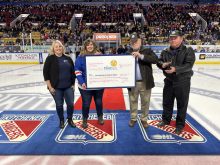 L to R: Feed Ontario’s Director of Development & Partnerships, Stephanie Ashton-Smith, The Food Bank of Waterloo Region CEO, Kim Wilhelm, Waterloo Region pork producer Stewart Cressman, and Ontario Pork Board Chair John de Bruyn.