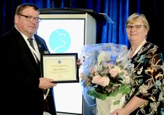 John de Bruyn, left, was recognized for his leadership and dedication to the pork sector after 13 years of serving on the Ontario Pork board and his wife, Deb’s, right, unwavering support at Ontario Pork’s annual general meeting in Guelph.