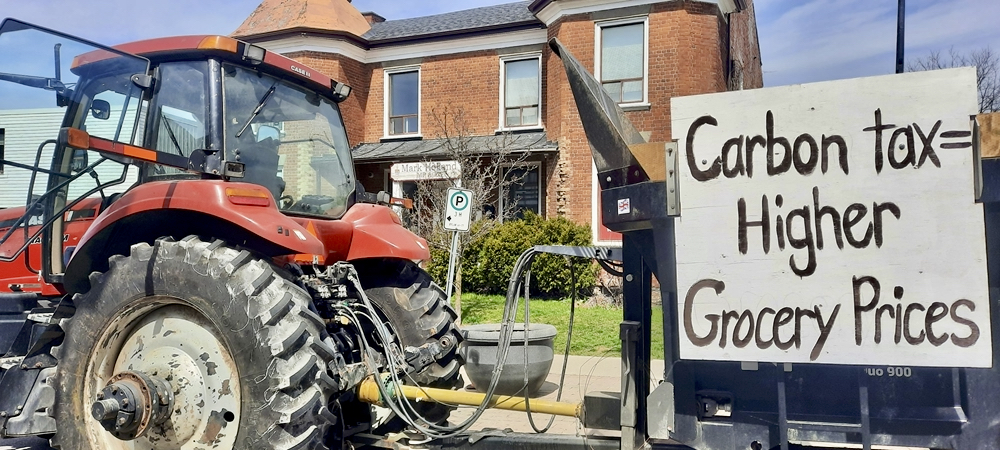 The tractor rally delivered a letter protesting the carbon tax and asking for support at three MP offices in the Whitby area, including MP Mark Holland’s office, shown here.