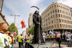 Protesters lead a model of reaper as Solidarity organisation and Polish farmers protest with Polish  and Solidarity flags and anti Green Deal banners in front of European Parlament building in the centre of Warsaw, the capital of Poland on May 10, 2024. The protest in Poland is part of the European farmers&#8217; protest against the EU&#8217;s Green Deal regulations. Polish farmers also demand a change to the EU agreement with Ukraine regarding the import of agricultural produce to the EU. The protest gathered over 100 thousand people. (Photo by Dominika Zarzycka/Sipa USA)
