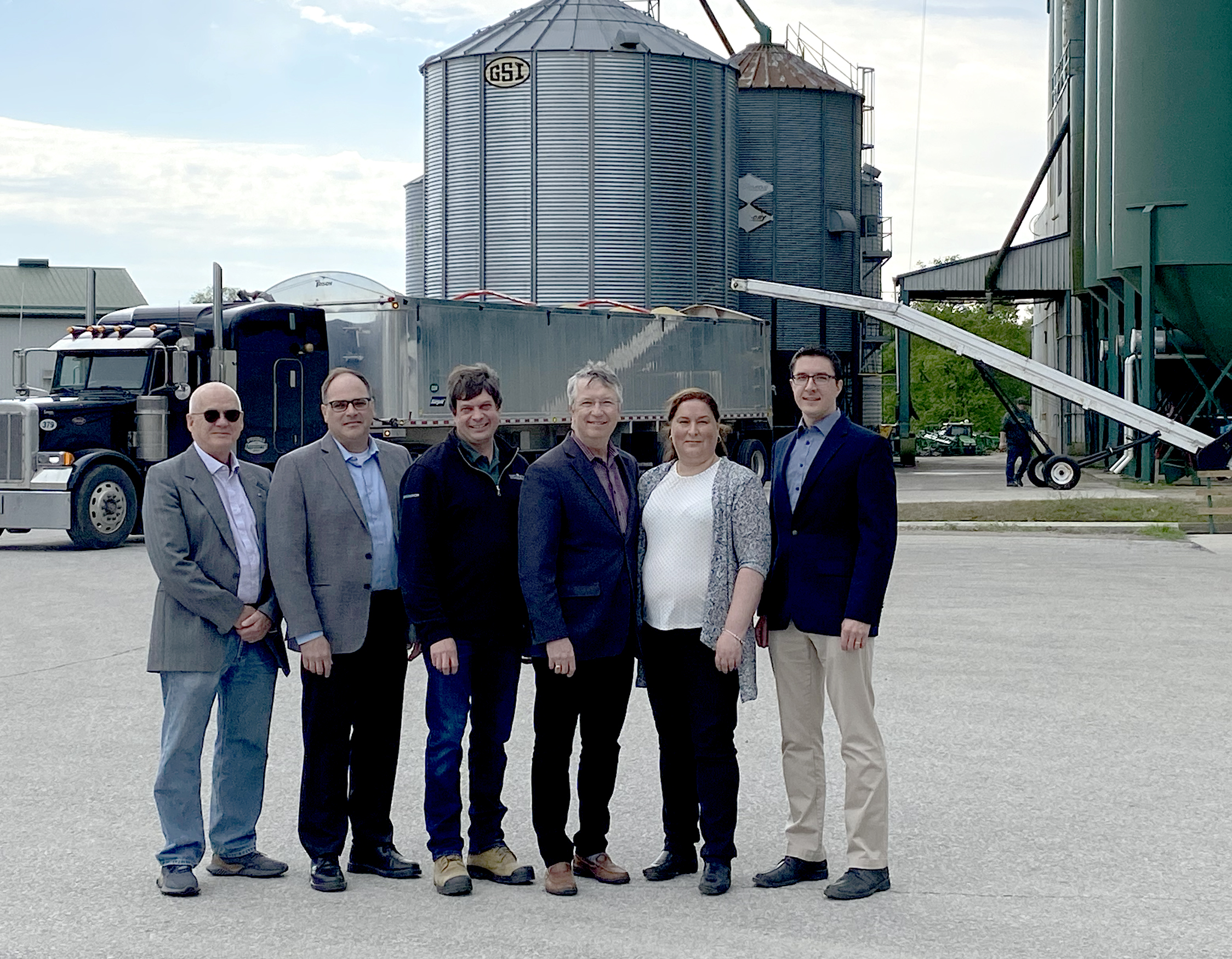 Wade Hainstock, CFCRA president, far left, Crosby Devitt, GFO CEO, Greg Hannam, Woodrill Farms Ltd., Guelph MP Lloyd Longfield, Heather Russell, Atlantic Grains Council executive director and Josh Cowan, CFCRA vice president, far right, announced a federal investment of $5.7 million in soybean, corn and oat research funding at Woodrill Farms Ltd in Guelph, Ont. May 13