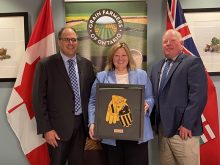 (L to R): Crosby Devitt, Grain Farmers of Ontario CEO; Ontario Agriculture and Agri-food Minister Lisa Thompson; Jeff Harrison, Grain Farmers of Ontario chair.