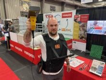 Francois Tellet, of Cooperl holding up a 3D camera.