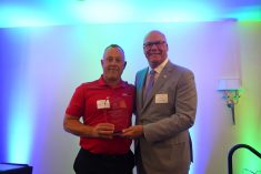 (L) Jeremy Matuszewski, Thunderstruck Ag with (R ) The Honourable Rob Flack, Minister, Ontario Ministry of Agriculture, Food and Agribusiness. 