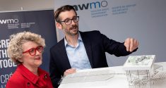 Laurie Swami, Nuclear Waste Management Organization (NWMO) president and CEO, left, looks over a model of Canada's first deep geological repository for the nation's used nuclear fuel slated to be built Northern Ontario near the Township of Ignace and Wabigoon Lake Ojibway Nation. PHOTO: Nuclear Waste Management Organization