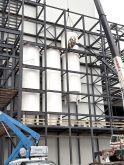 Silos are slotted carefully into place within the skeleton of Parrish and Heimbecker Milling Group’s third mill at the Hamilton port facility.