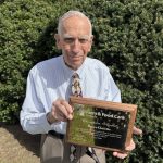Bruce Christie with the FFCO Champion award.