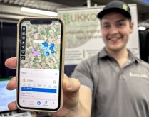 Nikolas Marsiglio, UKKO Agro account manager, shows off the ForeSite app at the London Farm Show March 5, 2025. The app provides targeted field-level weather, growth stage and disease pressure data, including tar spot, triggering advanced notice for proactive fungicide application. 