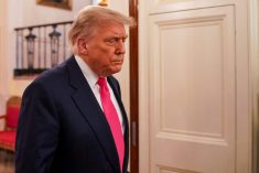 FILE PHOTO: U.S. President Donald Trump walks on the day of a “One Big Beautiful” event at the White House in Washington, DC., U.S., June 26, 2025. REUTERS/Nathan Howard/File Photo