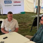 Scott Moe, left, talks to Western Producer reporter Sean Pratt at the Ag in Motion farm show near Langham, Saskatchewan. Photo: Paul Yanko