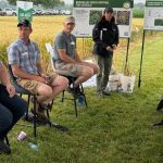 Speaking during a panel discussion hosted by Bayer during its recent “It’s Grow Time” research plot tour near Tavistock are Great Lakes Yield Enhancement Network (YEN) participants, from left: Adam Ireland of Teeswater, Blair Freeman of Owen Sound and Jeff Cook of Talbotville. Photo: Stew Slater