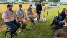 Speaking during a panel discussion hosted by Bayer during its recent “It’s Grow Time” research plot tour near Tavistock are Great Lakes Yield Enhancement Network (YEN) participants, from left: Adam Ireland of Teeswater, Blair Freeman of Owen Sound and Jeff Cook of Talbotville. Photo: Stew Slater