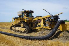 Drainage tile being installed in a farm field in Essex county, Ontario. Photo: Matt McIntosh