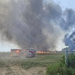 Emergency crews on scene at the Grand River Raceway, outside of Elora Ontario where a combine harvester caught fire. Photo source: Ontario Provincial Police