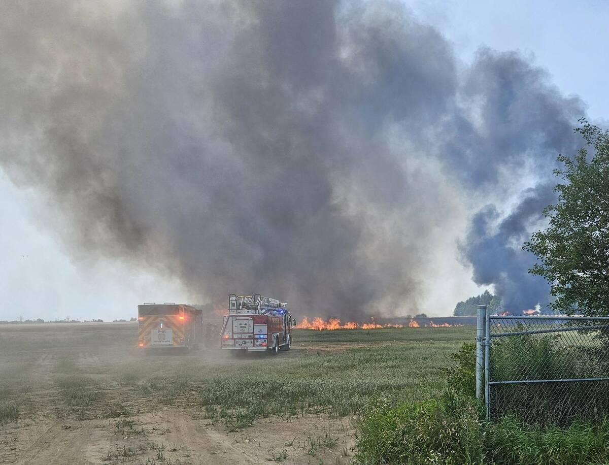 Emergency crews on scene at the Grand River Raceway, outside of Elora Ontario where a combine harvester caught fire. Photo source: Ontario Provincial Police