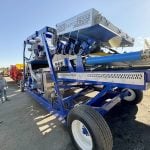 The HJV Split Grader prototype, featuring an integrated Tomra 3A optical sorter to detect and remove debris and green potatoes, drew plenty of attention during the Ontario Potato Board's Potato Field Day Aug. 21 at HJV Equipment near Alliston. Photo Diana Martin