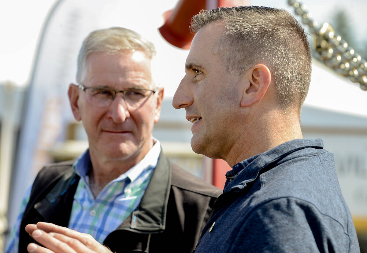 Trevor Jones, Ontario Minister of Agriculture, Food and Agribusiness, foreground, and Russell Redding, Pennsylvania Secretary of Agriculture, spent time in the Innovation in Agriculture tent at Canada's Outdoor Farm Show and touring the site on Sept. 10, 2025, . The men said, despite trade issues, farmers on each side of the border share the same goal and concerns when it comes to raising food. Photo Diana Martin