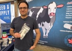 BioFerScience founder, president and chief technology officer Benham Abbasian displays a post-calving calcium bolus at COFS 2025.
