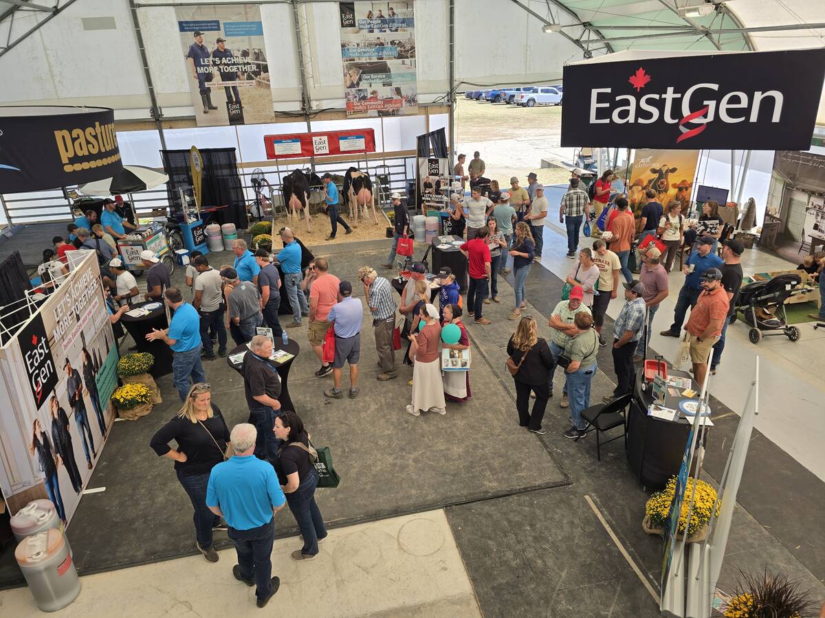 Producers gath in the Dairy Innovations Centre at the 2025 Canada's Outdoor Farm Show for the unveiling of EastGen’s refreshed brand identity while enjoying a complimentary customer appreciation lunch.