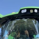 An attendee checks out the view from the driver’s seat of a John Deere S7 combine at Canada’s Outdoor Farm Show on Sept. 11. Photo: Greg Berg