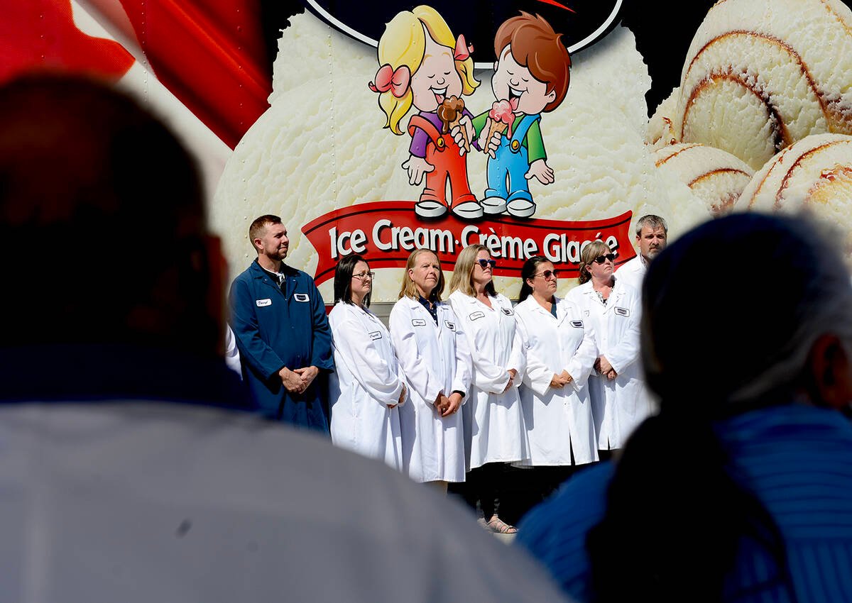 David and Penny Chapman, co-founders of Chapman's Ice Cream, in Markdale, On., frame employees representing the 800-strong company workforce during a $27 million Invest Ontario contribution to add to the manufacturer's $200 million expansion expected to open in May-June 2026. Photo Diana Martin