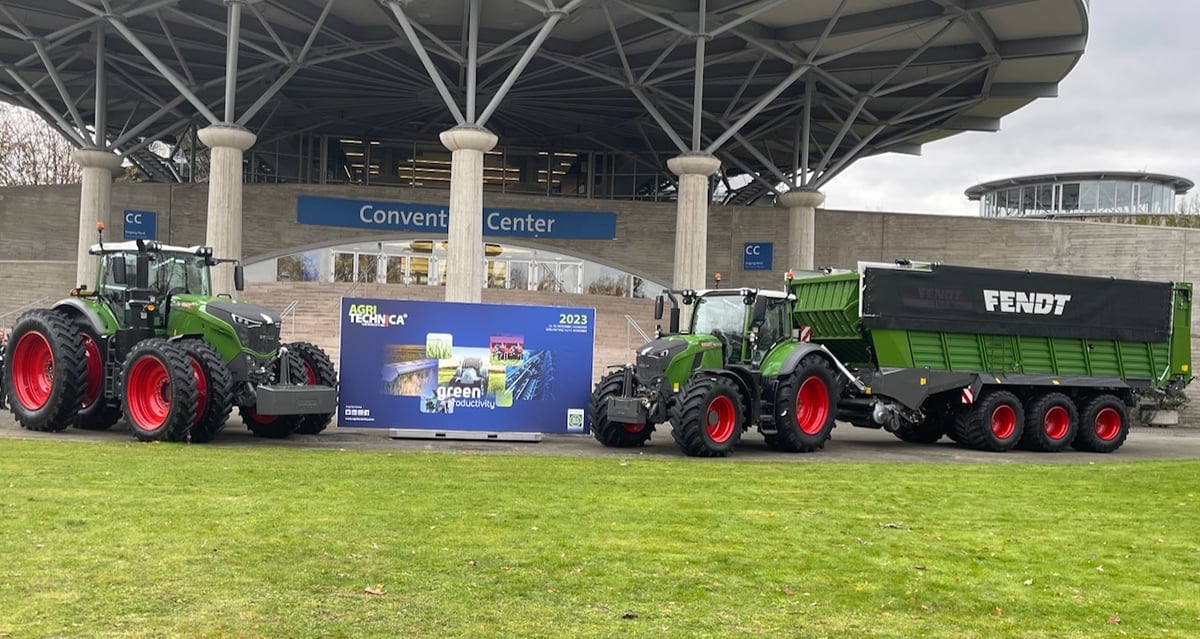 A view of an Agritechnica sign and two Fendt tractors at Agritechnica in 2023. Photo: John Greig