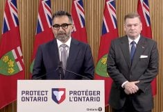 Hassan Basit, Ontario's first Chief Conservation Officer, and Todd McCarthy, Minister of Environment, Conservation and Parks, right, announce the proposed amalgamation of the province's 36 Conservation Authority jurisdictions into larger regional operations to streamline policies and programming during a press conference on Oct. 31, 2025