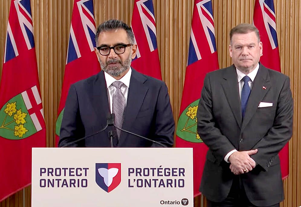 Hassan Basit, Ontario's first Chief Conservation Officer, and Todd McCarthy, Minister of Environment, Conservation and Parks, right, announce the proposed amalgamation of the province's 36 Conservation Authority jurisdictions into larger regional operations to streamline policies and programming during a press conference on Oct. 31, 2025
