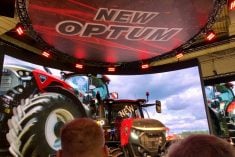 Case IH&#8217;s new Optum 440 tractor moments after the curtain was dropped on the first day of Agritechnica 2025, on November 9, in Hannover, Germany.  Photo: Greg Berg
