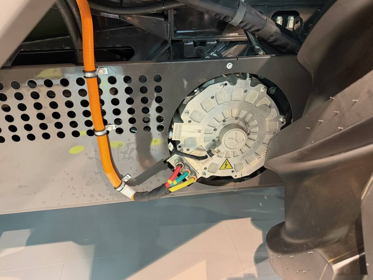 Zoomlion’s electric drive for the auger is one of several electric motors on a concept combine shown at Agritechnica 2025. Photo: John Greig