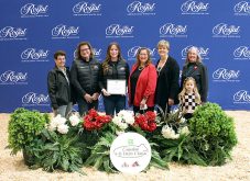 Jocelyn Lambert, centre left holding frame,  of the Middlesex 4-H Association received the 2025 Bertram and Hazel Stewart 4-H Dairy Youth Education Award and Bursary at the Royal Agricultural Winter Fair in Toronto on November 11. Photo: 4-H Canada