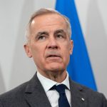 Canada’s Prime Minister Mark Carney looks on during his meeting with Ukrainian President Volodymyr Zelenskiy in Halifax, Nova Scotia, Canada, December 27, 2025. REUTERS/Darren Calabrese

