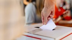 Close-up of hand placing ballot into voting box at election. Ballot and voting box symbolize democracy and elections. Hand placing ballot in election voting box, casting a vote at election
PHOTO: Rawpixel/ISTOCK/GETTY IMAGES