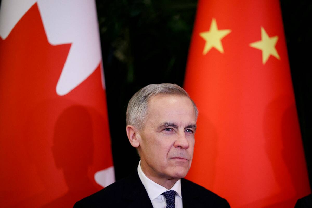 Mark Carney looks on as he meets the chairman of the standing committee of the National People&rsquo;s Congress of China Zhao Leji (not pictured), during the first visit by a Canadian prime minister to China since 2017, at the Great Hall of the People, in Beijing on Jan. 15, 2026. Photo: REUTERS/Carlos Osorio

