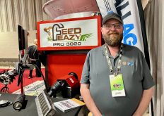 Todd Botterill, a salesperson with AllAgParts out of Stanley, Man., beside the Feed Eazy Pro 3020 that took top prize in the Animal & Livestock category at Manitoba Ag Days&rsquo; Innovation Showcase.  Photo: Greg Berg