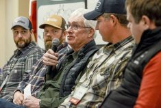 Feedlot operator, Dale Pallister, centre, flanked by Tom Cunningham, Darell Saunders, to the left, and Dr. Van Michell and Brad Gilchrist, to the right, shares what he looks for during sales to help producers understand what sire selections traits to consider when improving their own, and Ontario's beef herd as a whole, to maximize production value during Grey Bruce Farmer's  Week's Beef Day, Jan. 7, 2026 in Elmwood, On. Photo: Diana Martin