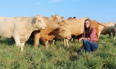 Abbey Taylor with some of the cattle on her farm. Photo: Courtesy Abbey Taylor