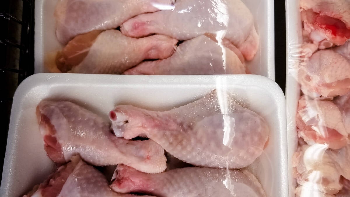 A variety of packages of chicken legs at the grocery store. Chicken demand has been significant over the past year, along with most other proteins. Photo: AHPPhotoswpg/Getty Images
