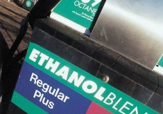 Close-up of a fuel pump displaying an ethanol blend label at a gas station. Photo: file
