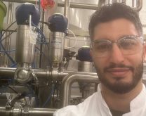 Andrew Chiappetta of Launch Bioindustries beside a bioreactor. Photo: Courtesy Launch Bioindustries